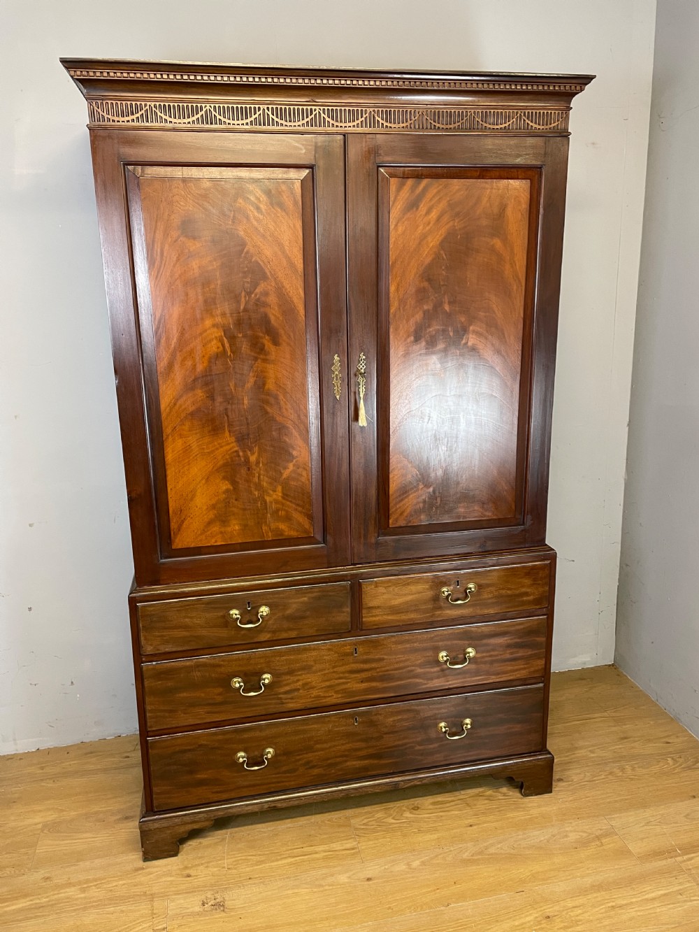 Antique Georgian flame mahogany clothes press circa 1790 View II