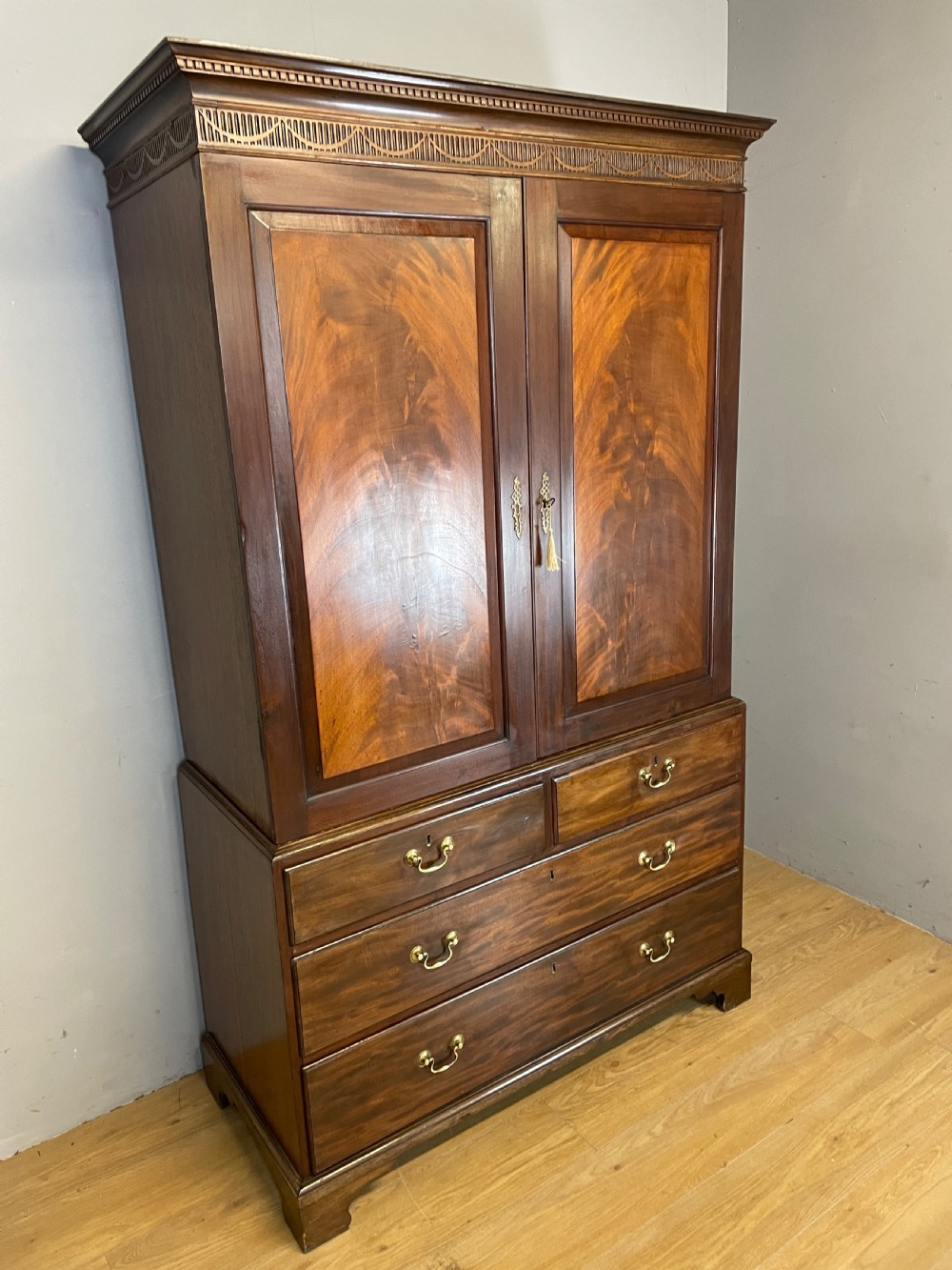 Antique Georgian flame mahogany clothes press circa 1790 View III