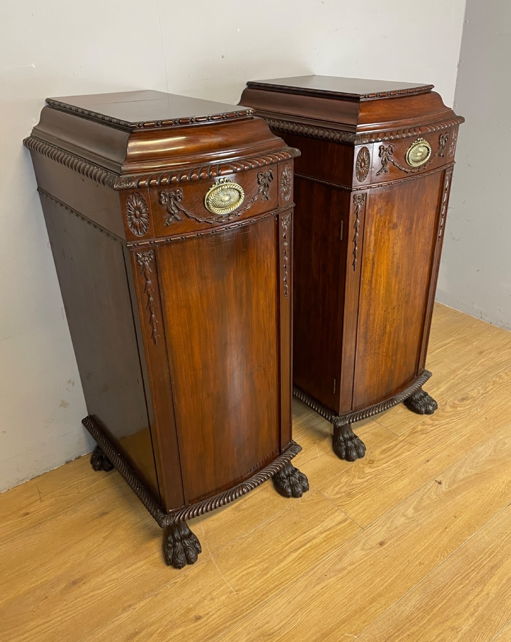 Antique pair of C19TH carved flame mahogany lamp pedestal cupboards 
