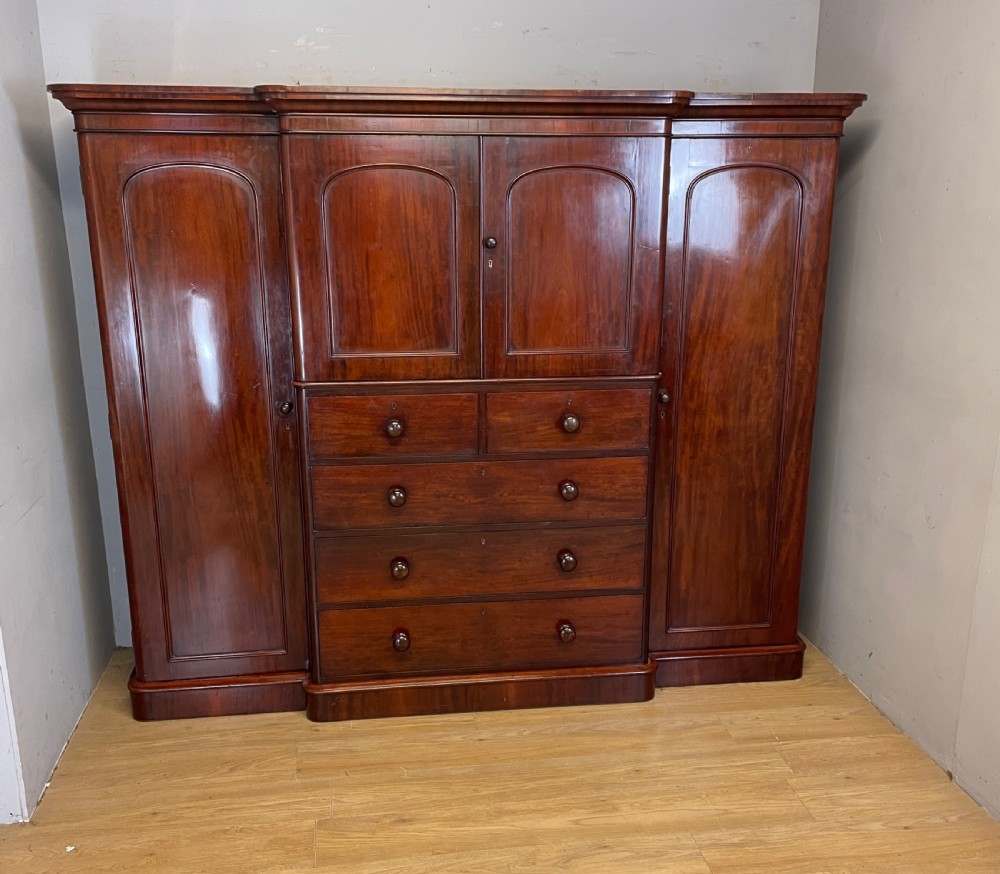 C19TH Country House flame mahogany breakfront wardrobe  View XV