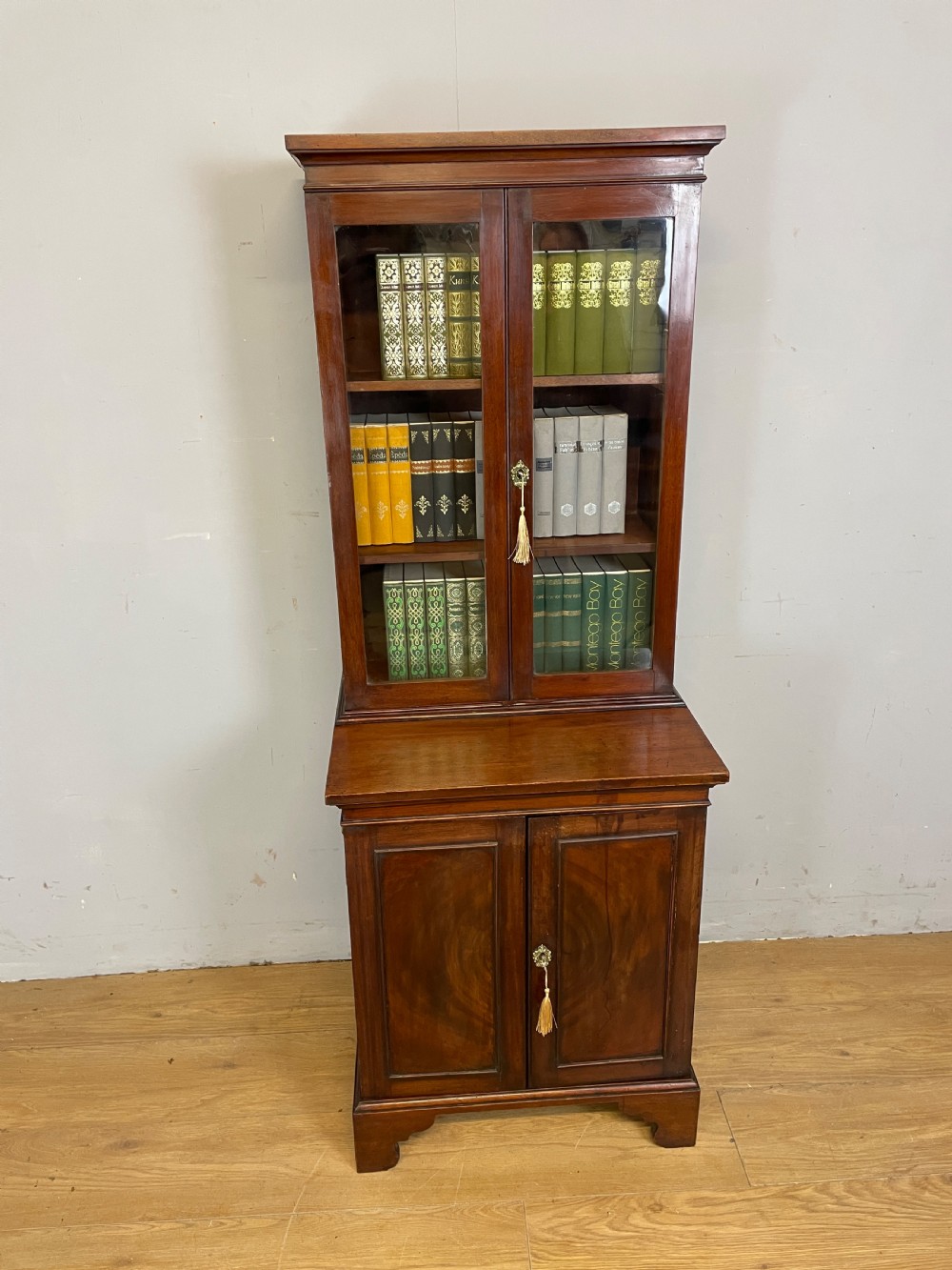 Small C19TH mahogany bookcase over cupboard Only 60 cm wide  View II