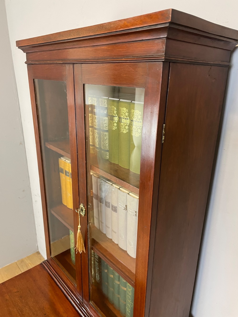 Small C19TH mahogany bookcase over cupboard Only 60 cm wide  View V