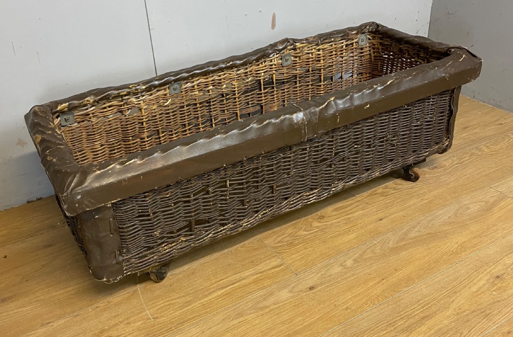 Wicker mill basket on wooden castors circa 1920 View II