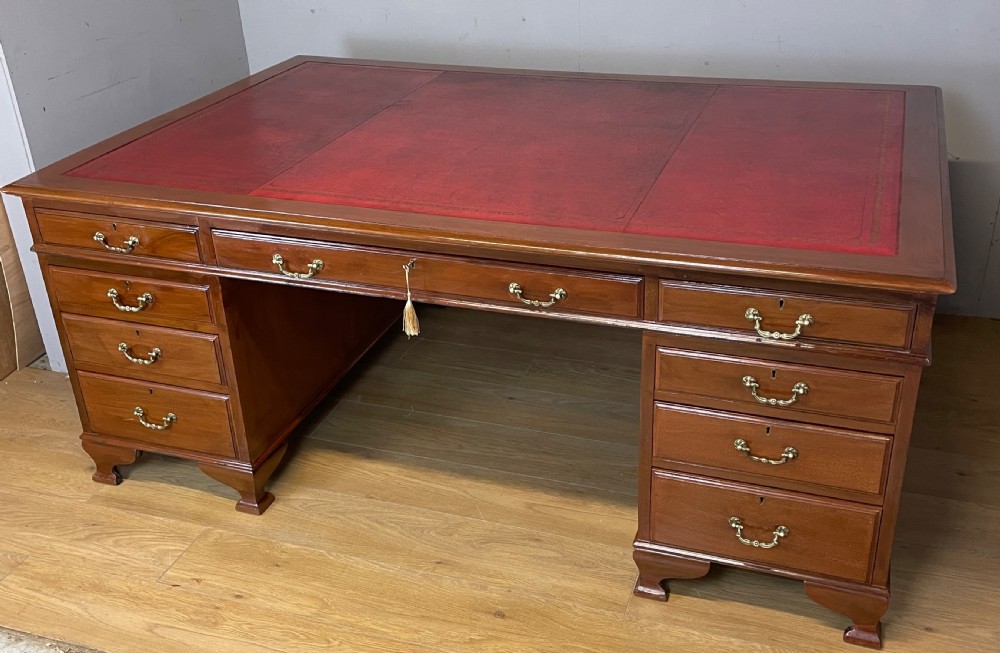 Large mahogany partners desk with inset leather leather top by Richardson of Leeds 