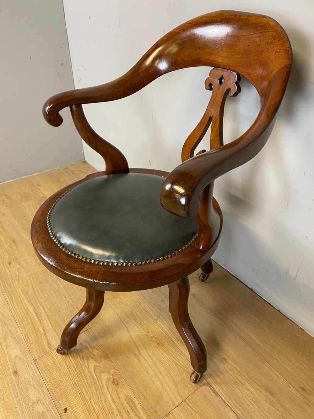 Victorian mahogany revolving desk chair with leather seat View III