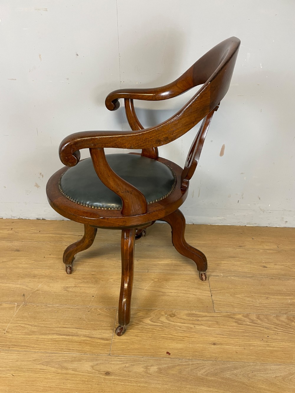 Victorian mahogany revolving desk chair with leather seat View V
