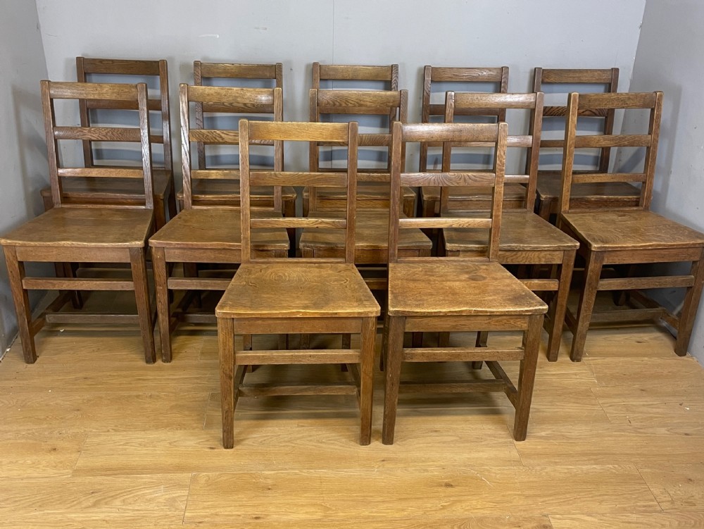 Edwardian set of 12 solid oak refectory chairs  View XII