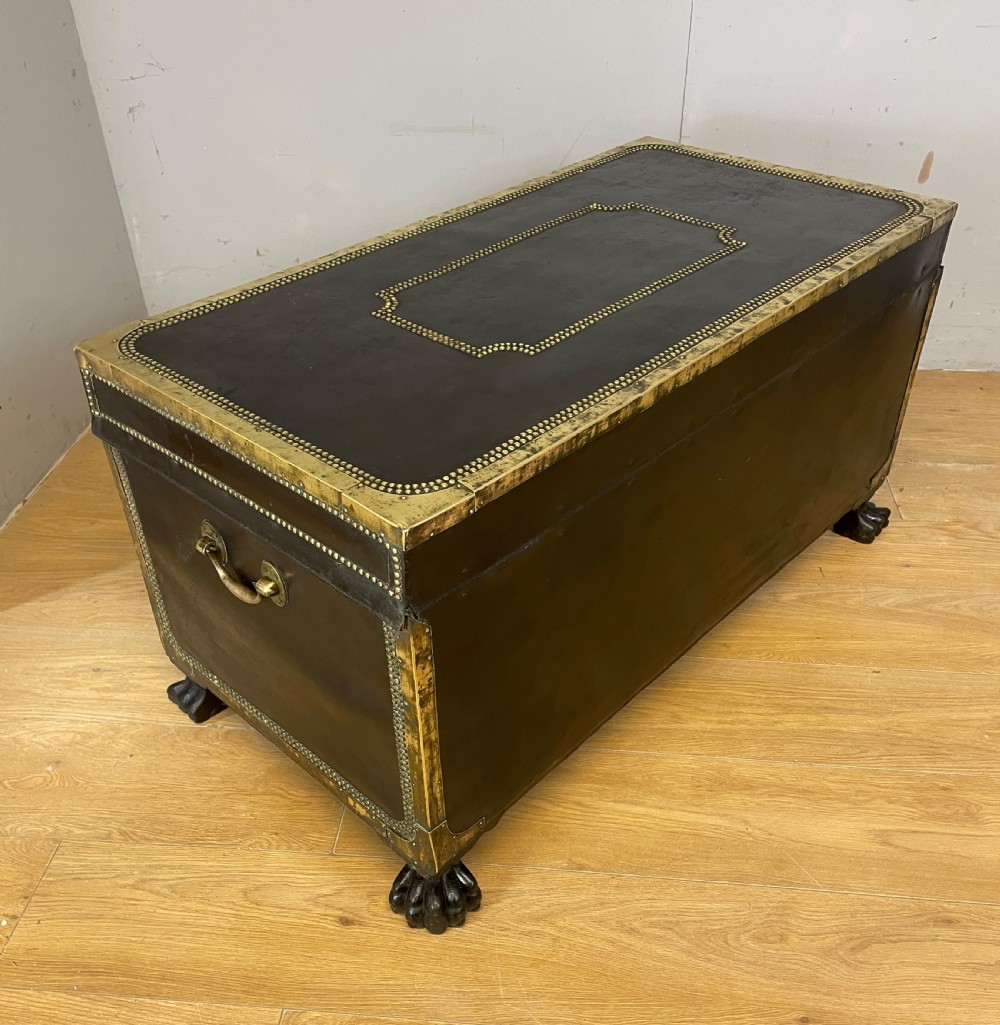 Regency brass studded leather camphor wood lined trunk on hairy paw feet  View XVI