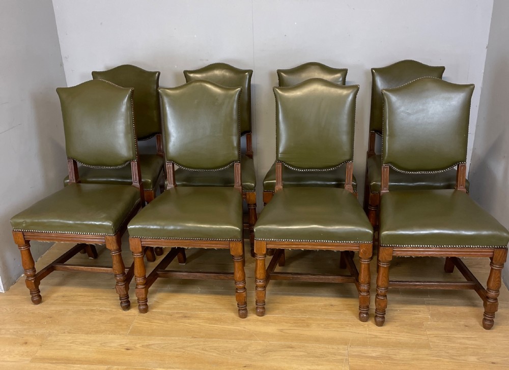 Arts and crafts golden oak set of eight dining chairs in green leather  View II