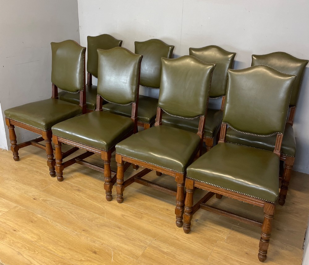 Arts and crafts golden oak set of eight dining chairs in green leather  View XIII