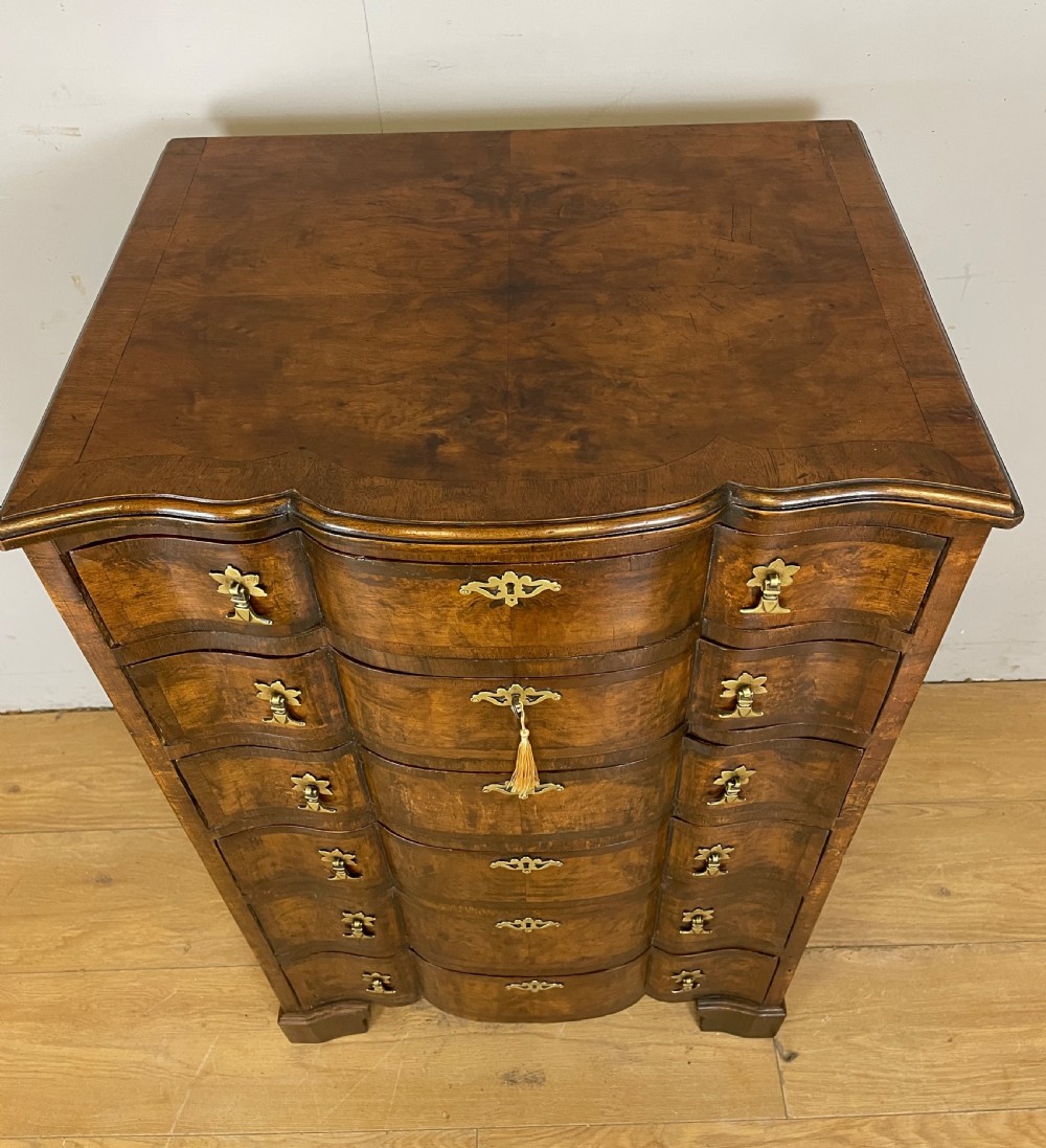 Serpentine burr walnut chest of drawers circa 1920 View II