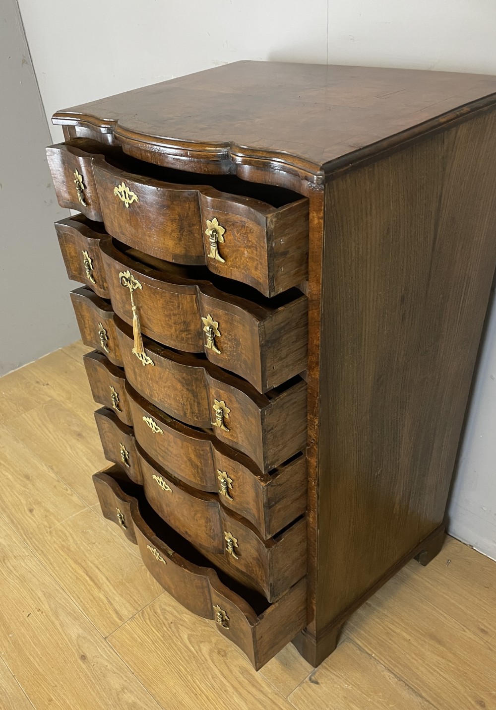 Serpentine burr walnut chest of drawers circa 1920 View IV