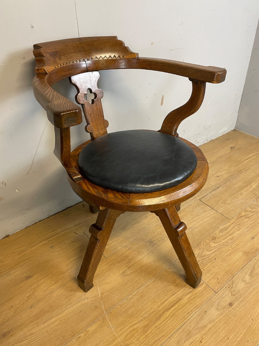 C19TH oak revolving desk chair with leather seat  View III