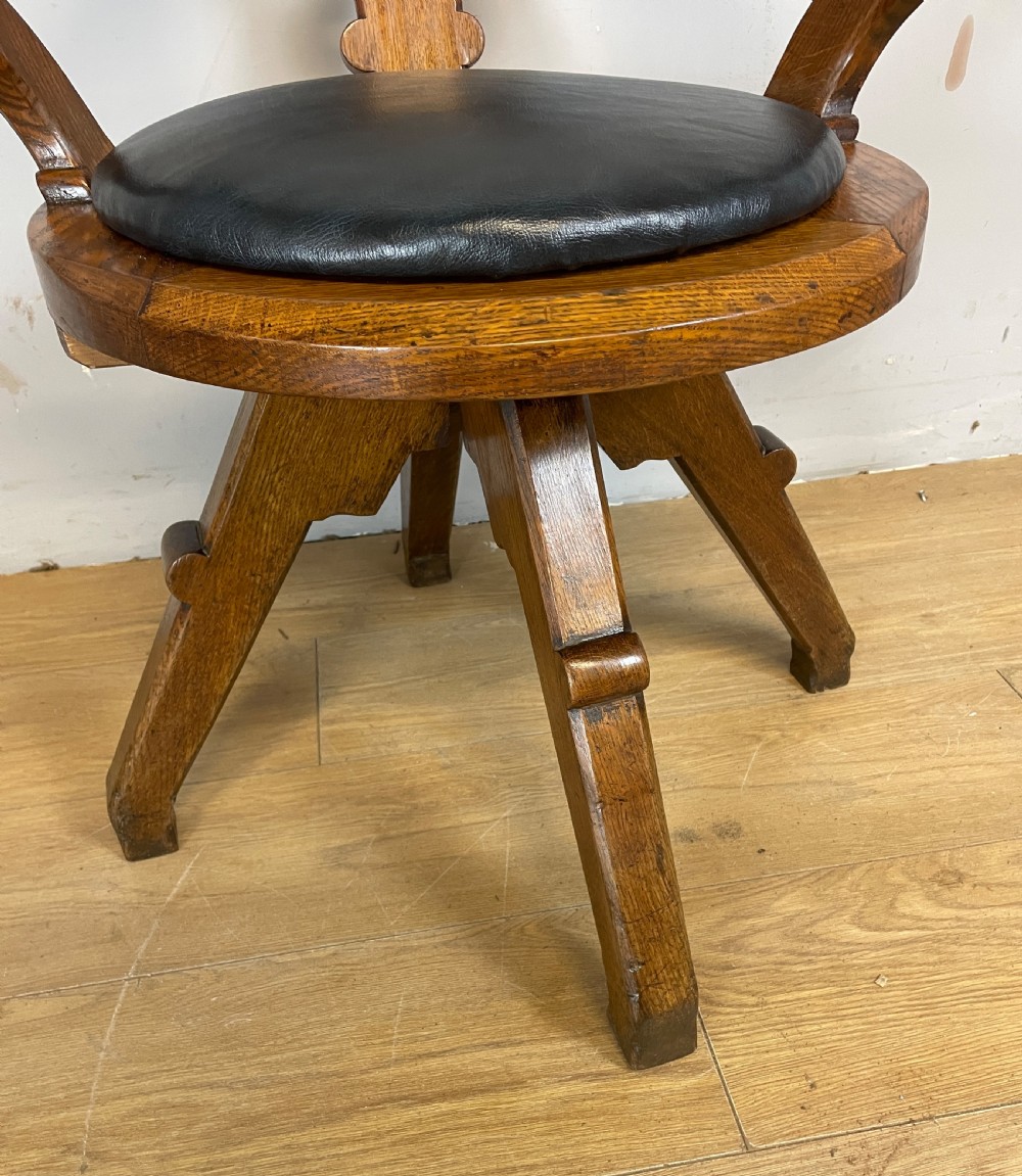 C19TH oak revolving desk chair with leather seat  View V