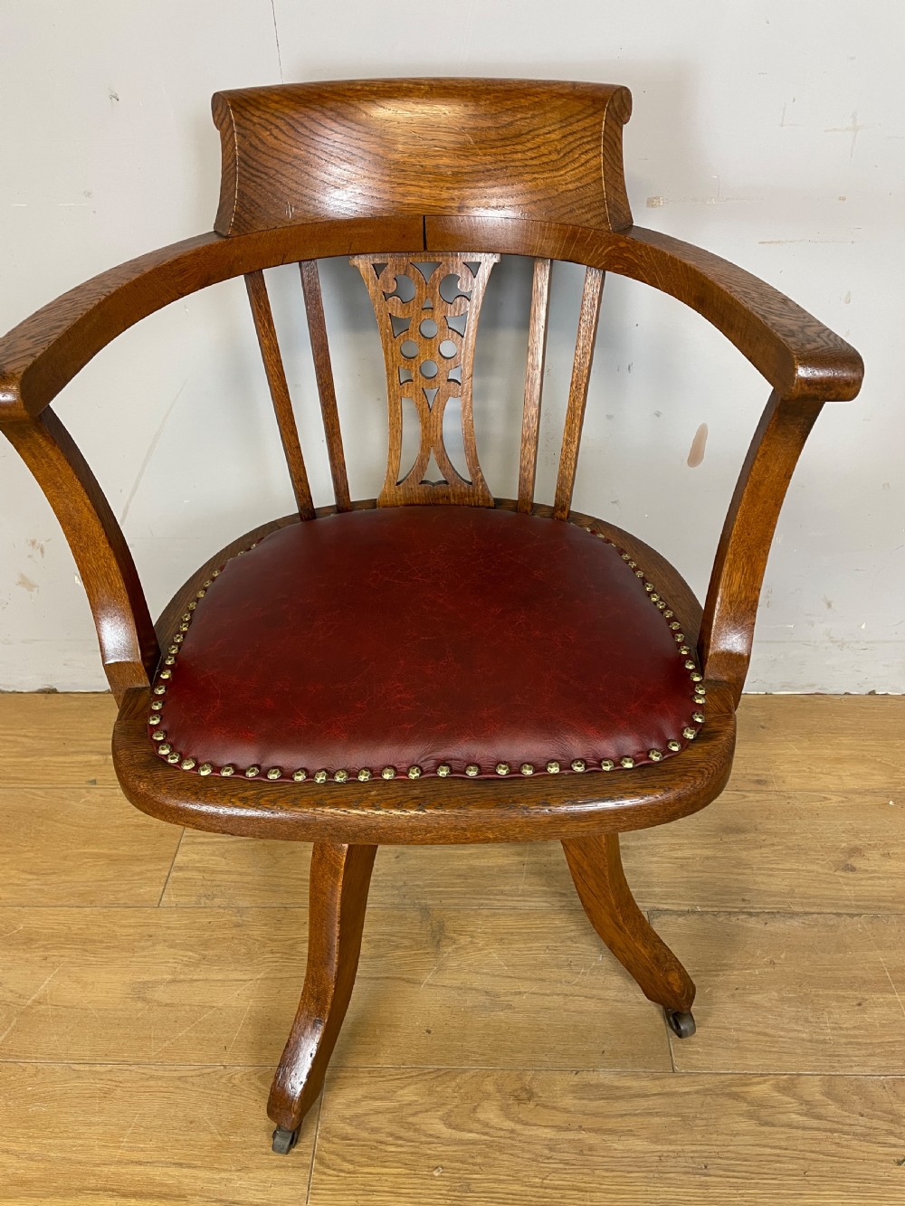 Edwardian oak revolving desk chair with red leather seat circa 1910 View III