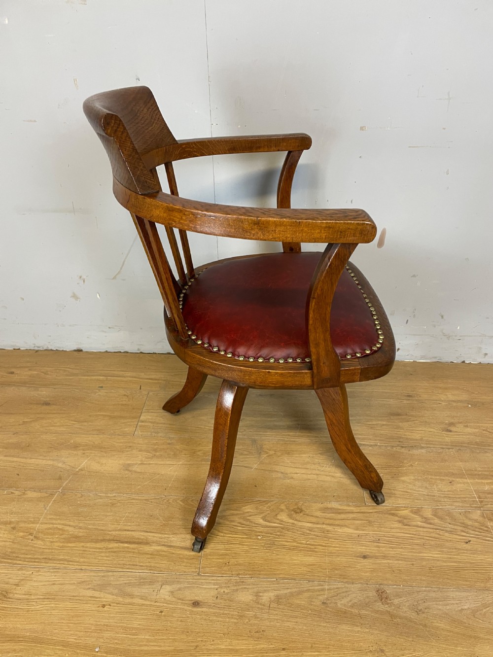 Edwardian oak revolving desk chair with red leather seat circa 1910 View VI
