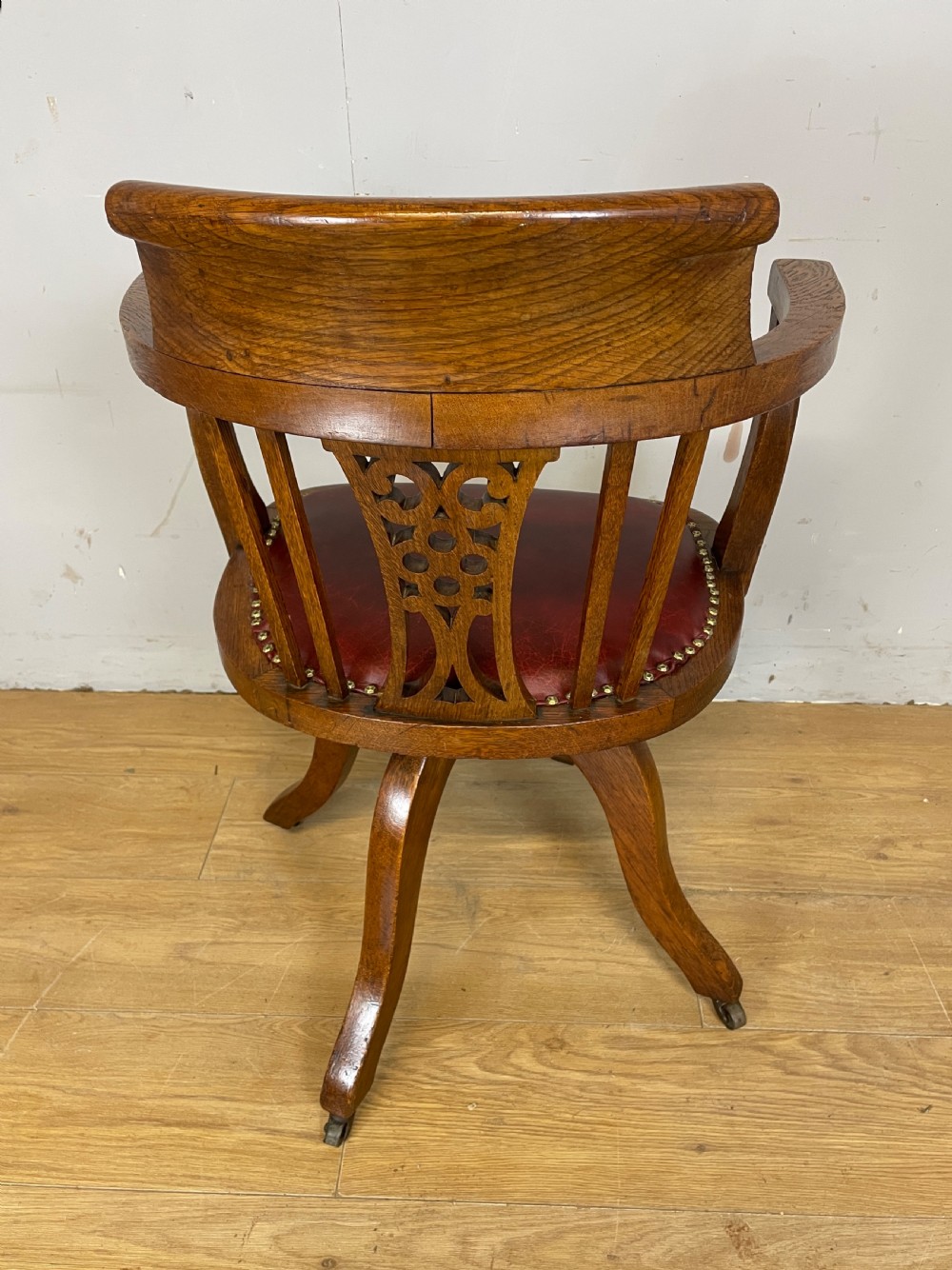 Edwardian oak revolving desk chair with red leather seat circa 1910 View VII