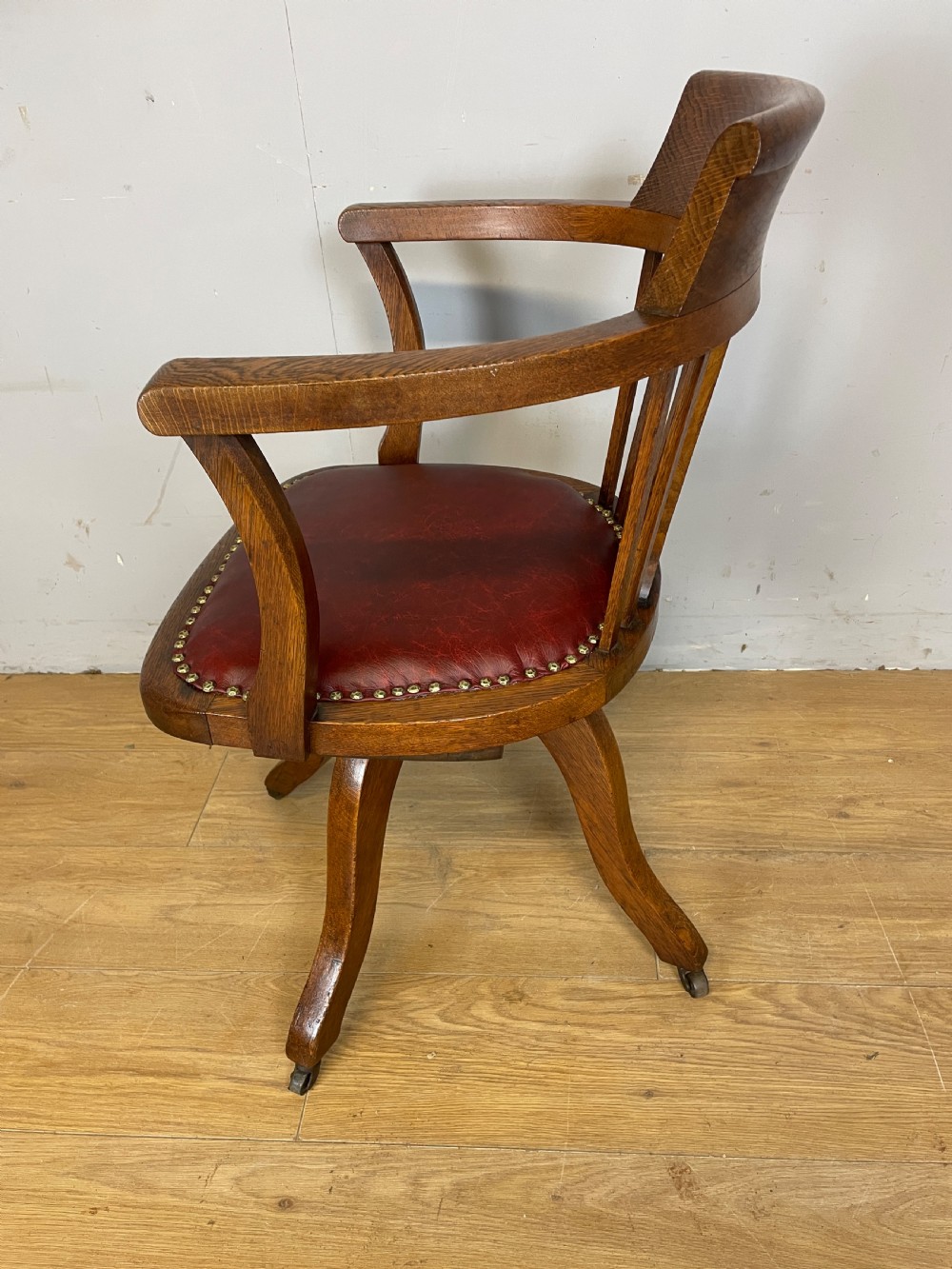 Edwardian oak revolving desk chair with red leather seat circa 1910 View VIII