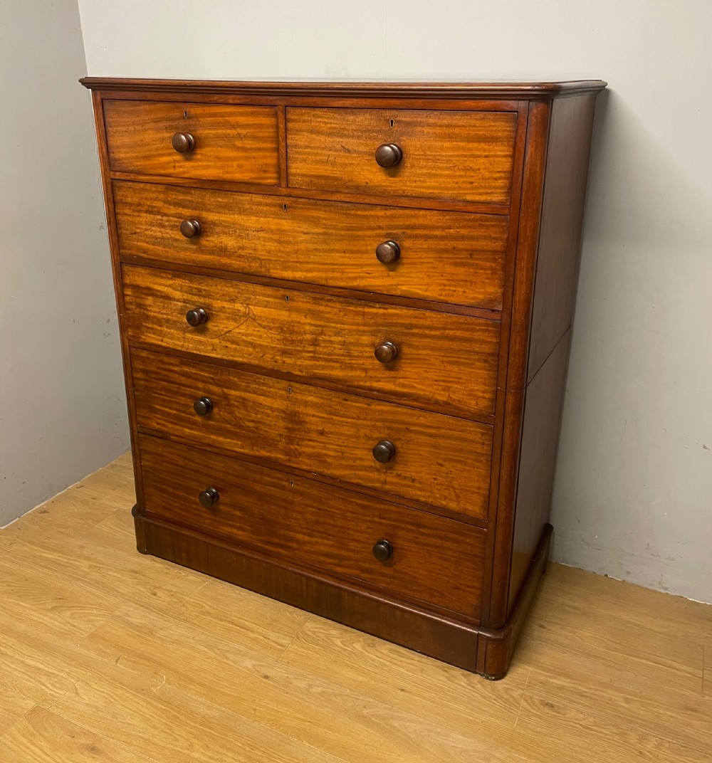 Mid C19TH two part mahogany five height chest of drawers  View II