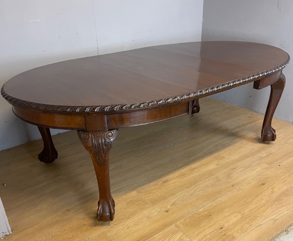 Solid mahogany Chippendale revival wind out dining table circa 1890 View II