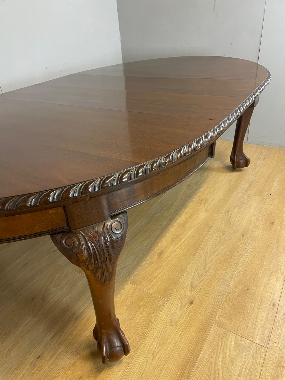 Solid mahogany Chippendale revival wind out dining table circa 1890 View V