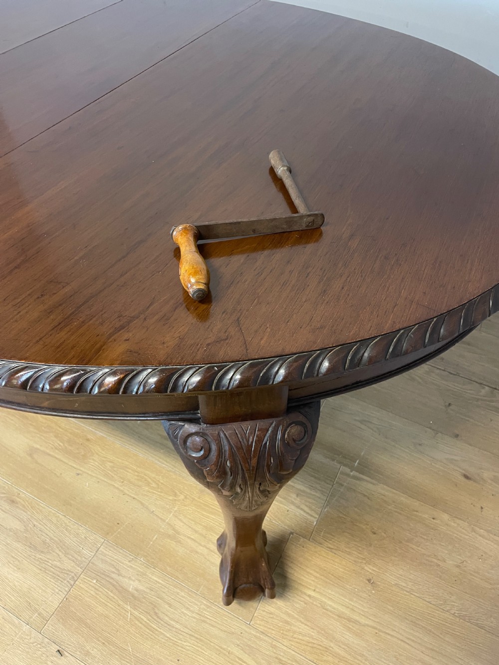 Solid mahogany Chippendale revival wind out dining table circa 1890 View VI