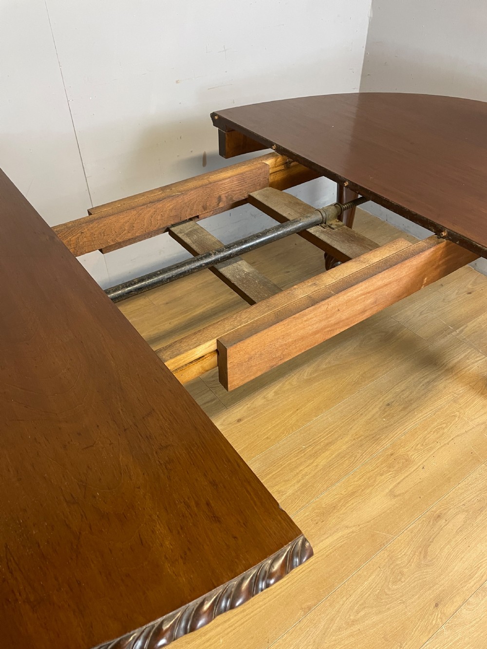 Solid mahogany Chippendale revival wind out dining table circa 1890 View VII