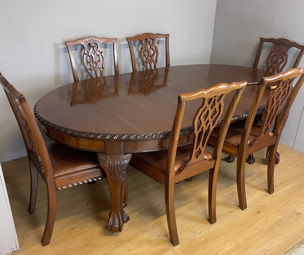 Solid mahogany Chippendale revival wind out dining table circa 1890 View X