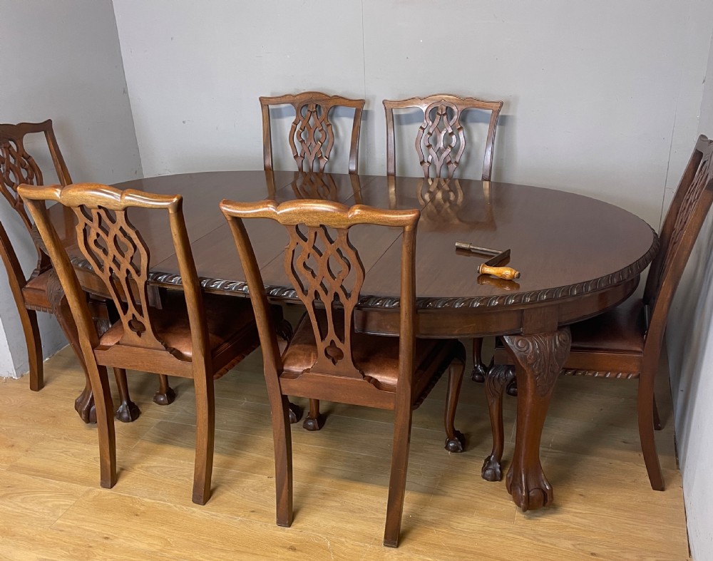Solid mahogany Chippendale revival wind out dining table circa 1890 View XI