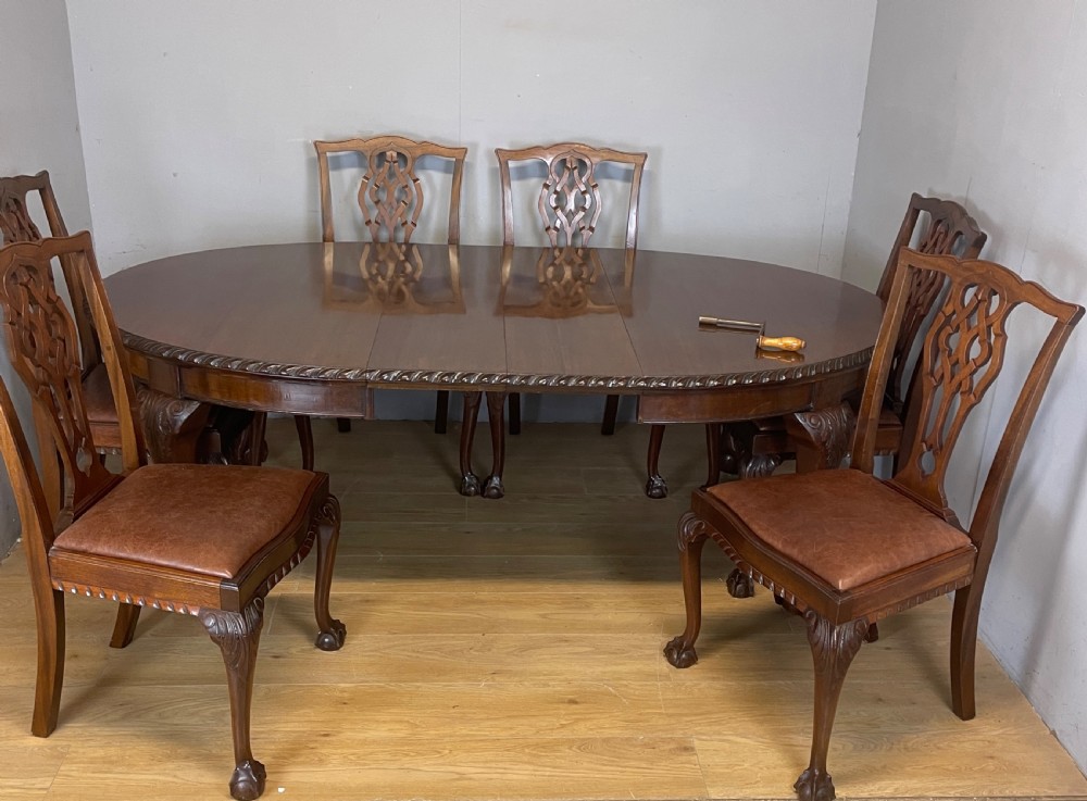 Solid mahogany Chippendale revival wind out dining table circa 1890 View XII