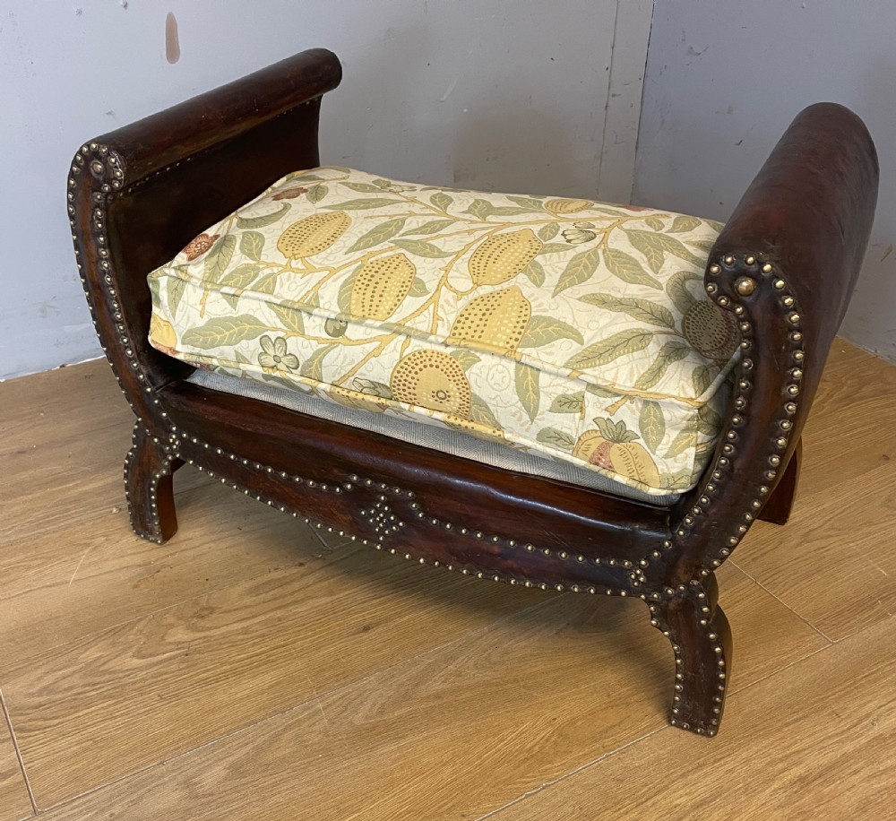 Arts and crafts leather footstool with decorative brass studs  View VI
