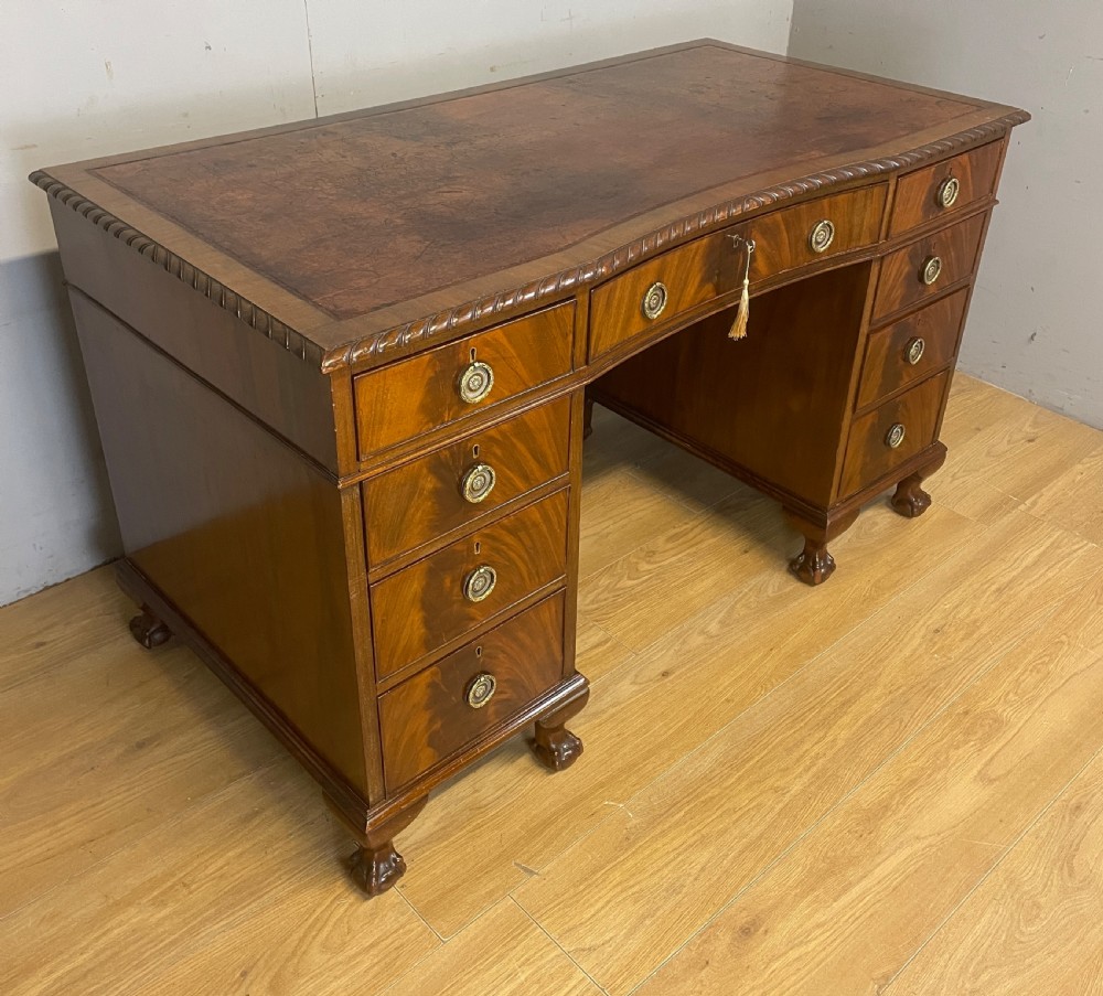 Mahogany Chippendale style desk on ball and claw feet circa 1920 