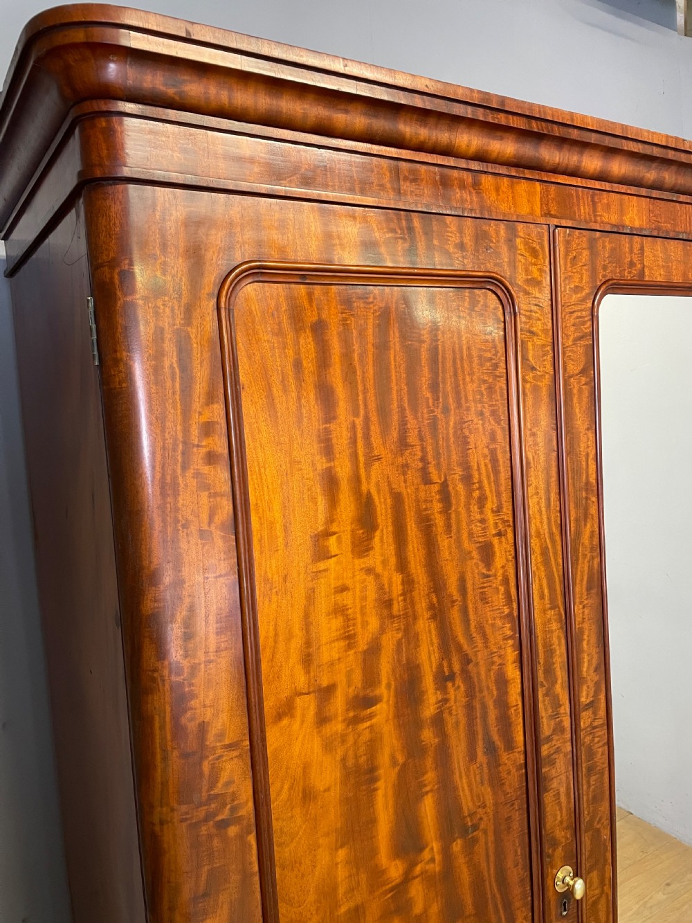 C19TH country house flame mahogany triple wardrobe  View III