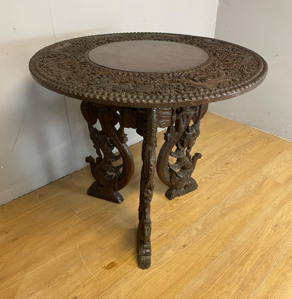 C19TH Burmese carved centre table 