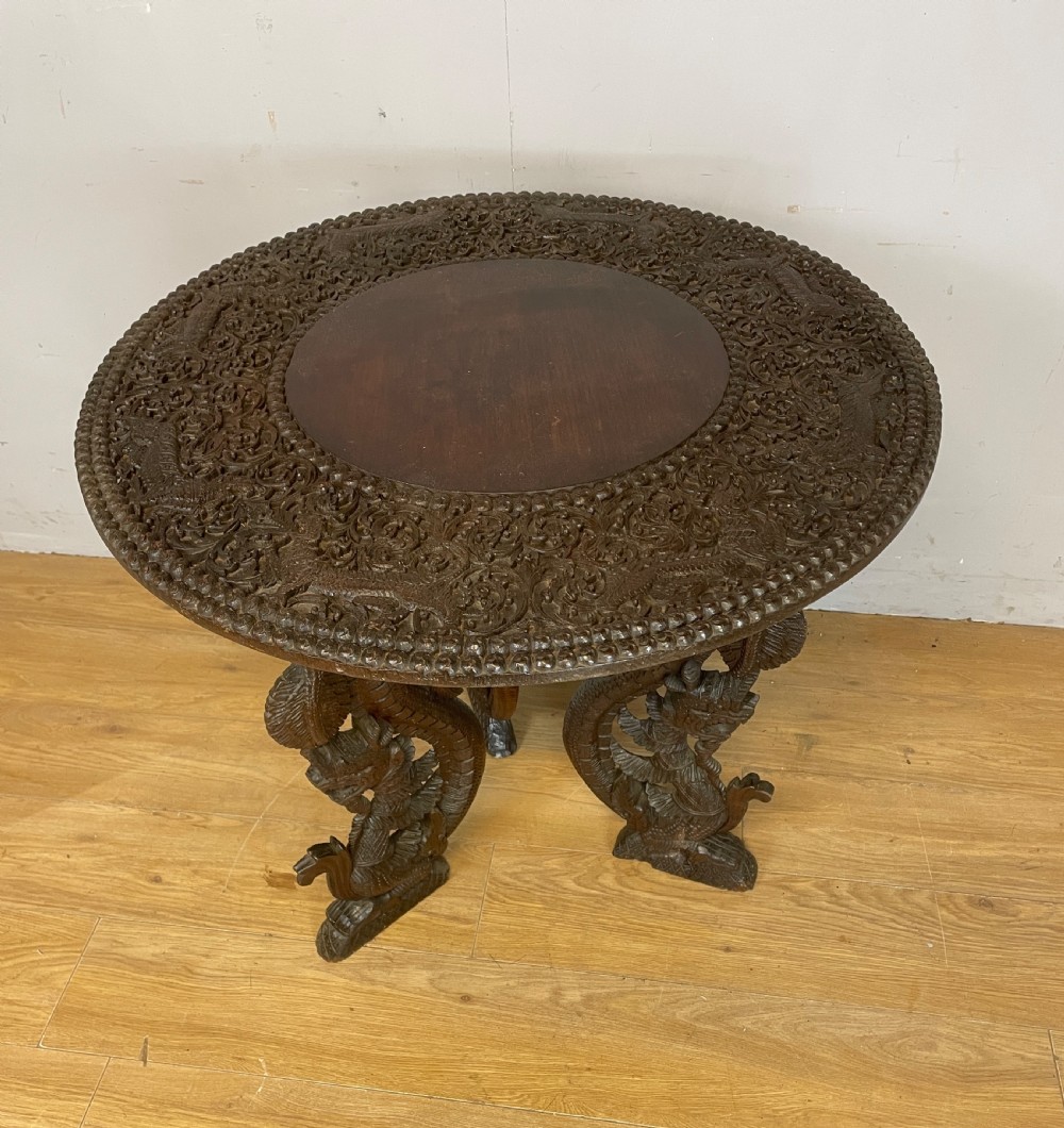C19TH Burmese carved centre table  View IV