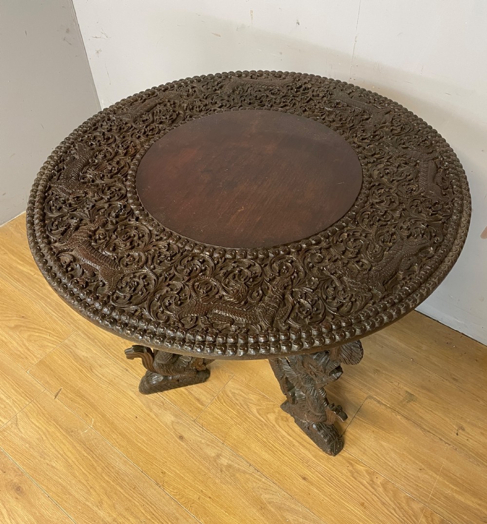C19TH Burmese carved centre table  View V