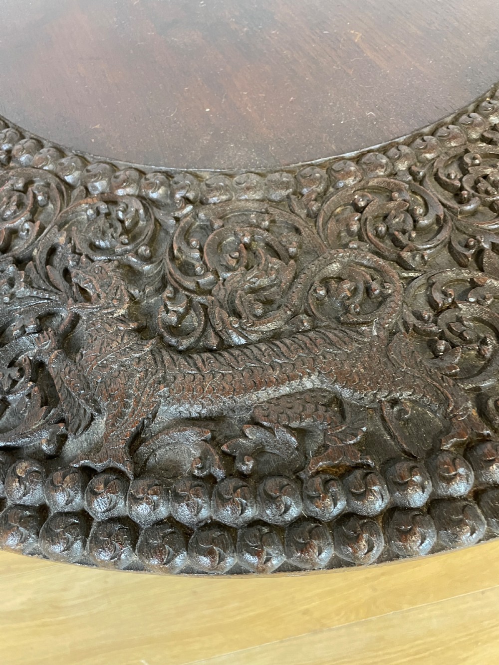 C19TH Burmese carved centre table  View XI
