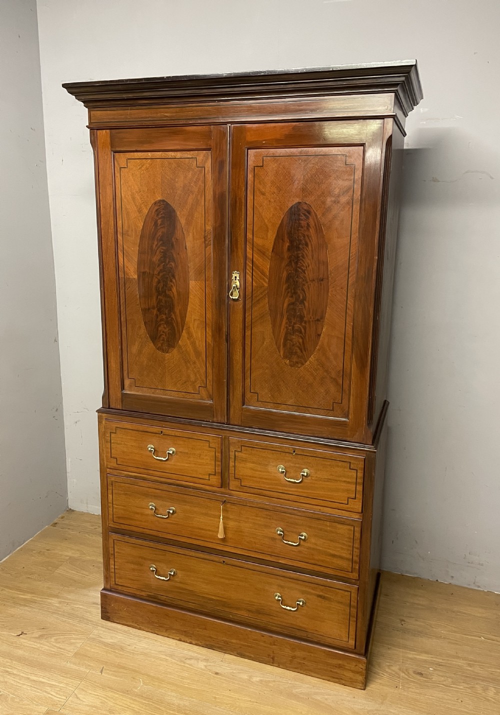 C19TH inlaid mahogany linen press by Shoolbred of London 