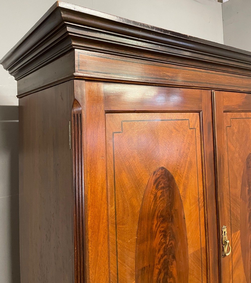 C19TH inlaid mahogany linen press by Shoolbred of London  View VI