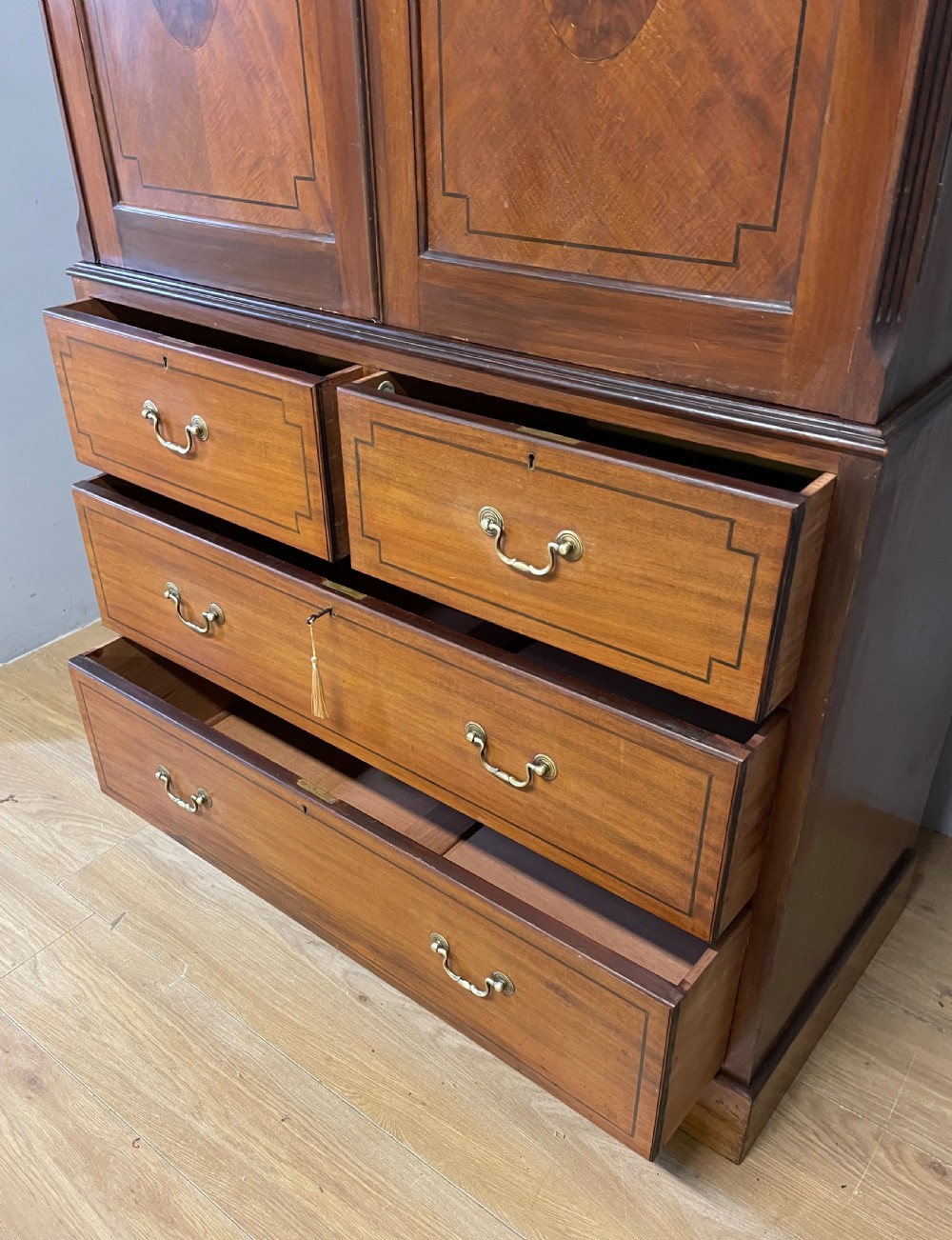 C19TH inlaid mahogany linen press by Shoolbred of London  View IX