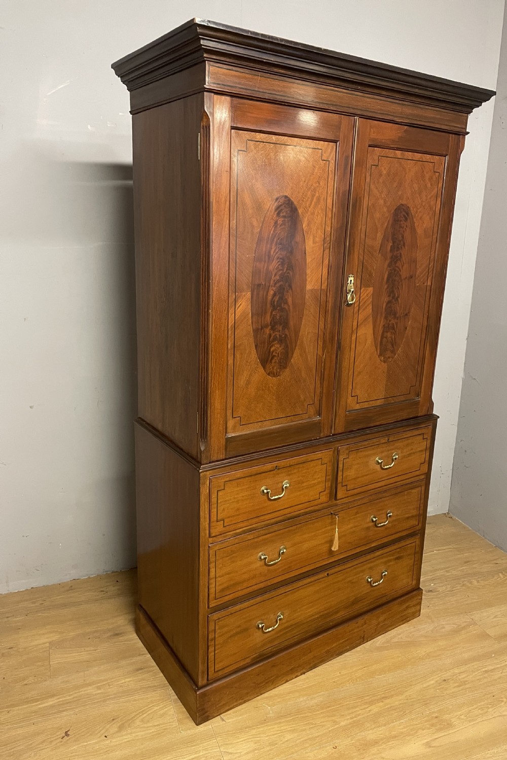 C19TH inlaid mahogany linen press by Shoolbred of London  View X
