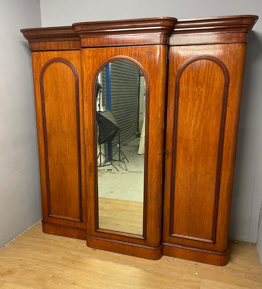C19TH country house mahogany breakfront triple wardrobe  View XIV