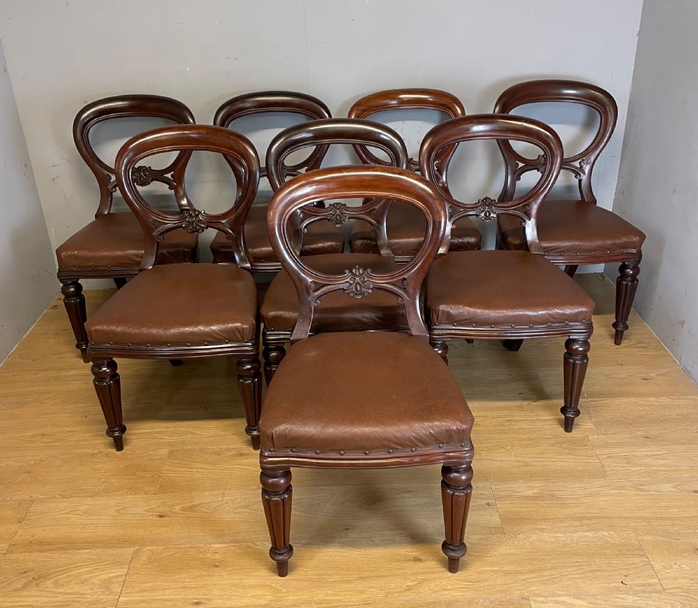 C19TH set of eight mahogany balloon back chairs by a London maker View II