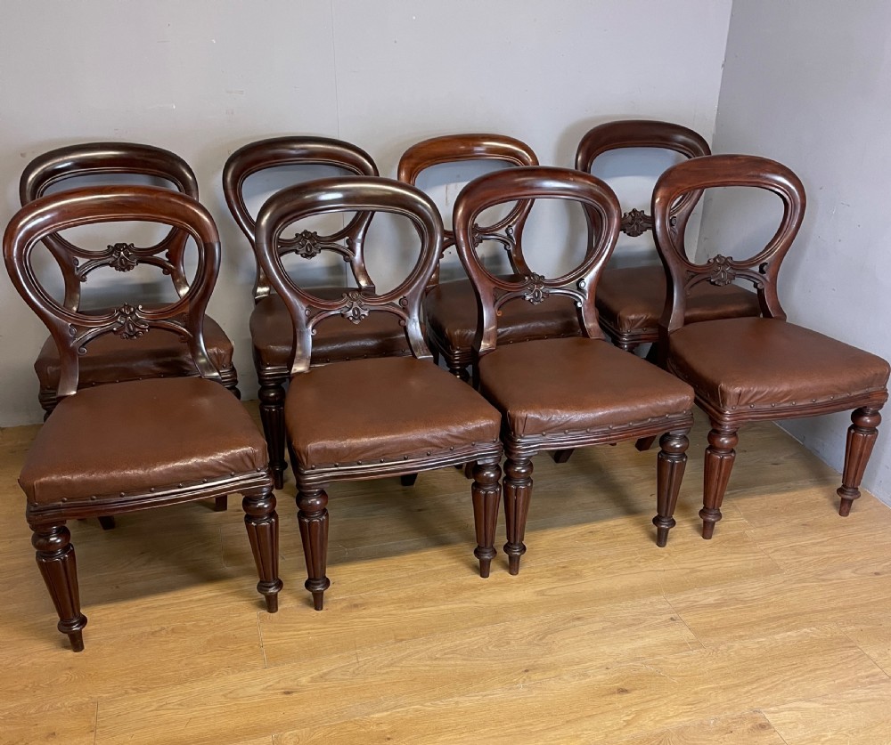 C19TH set of eight mahogany balloon back chairs by a London maker View III