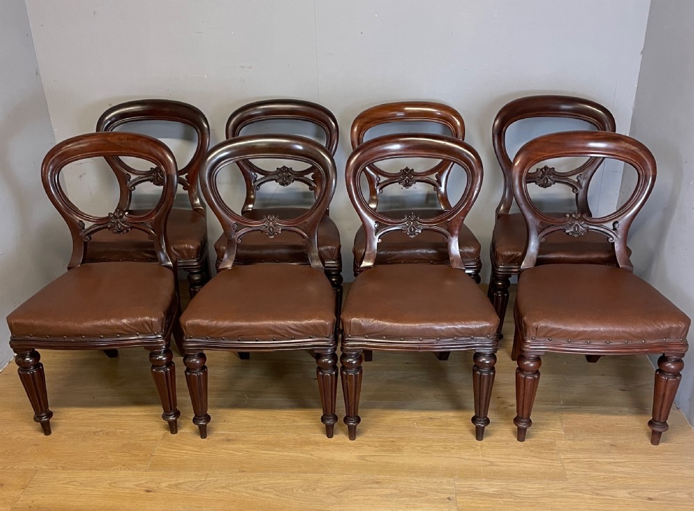 C19TH set of eight mahogany balloon back chairs by a London maker View IV
