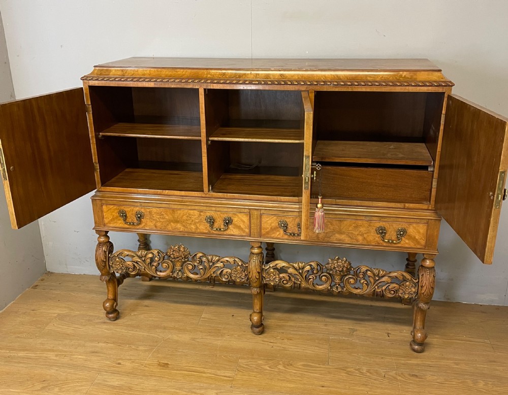 Burr walnut side cabinet on a carved base circa 1920 View IV