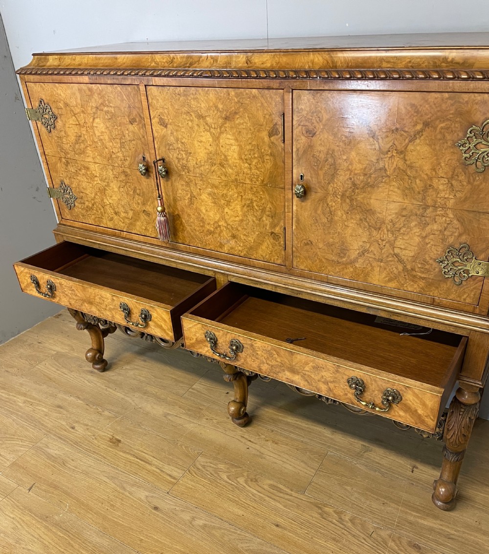 Burr walnut side cabinet on a carved base circa 1920 View VI