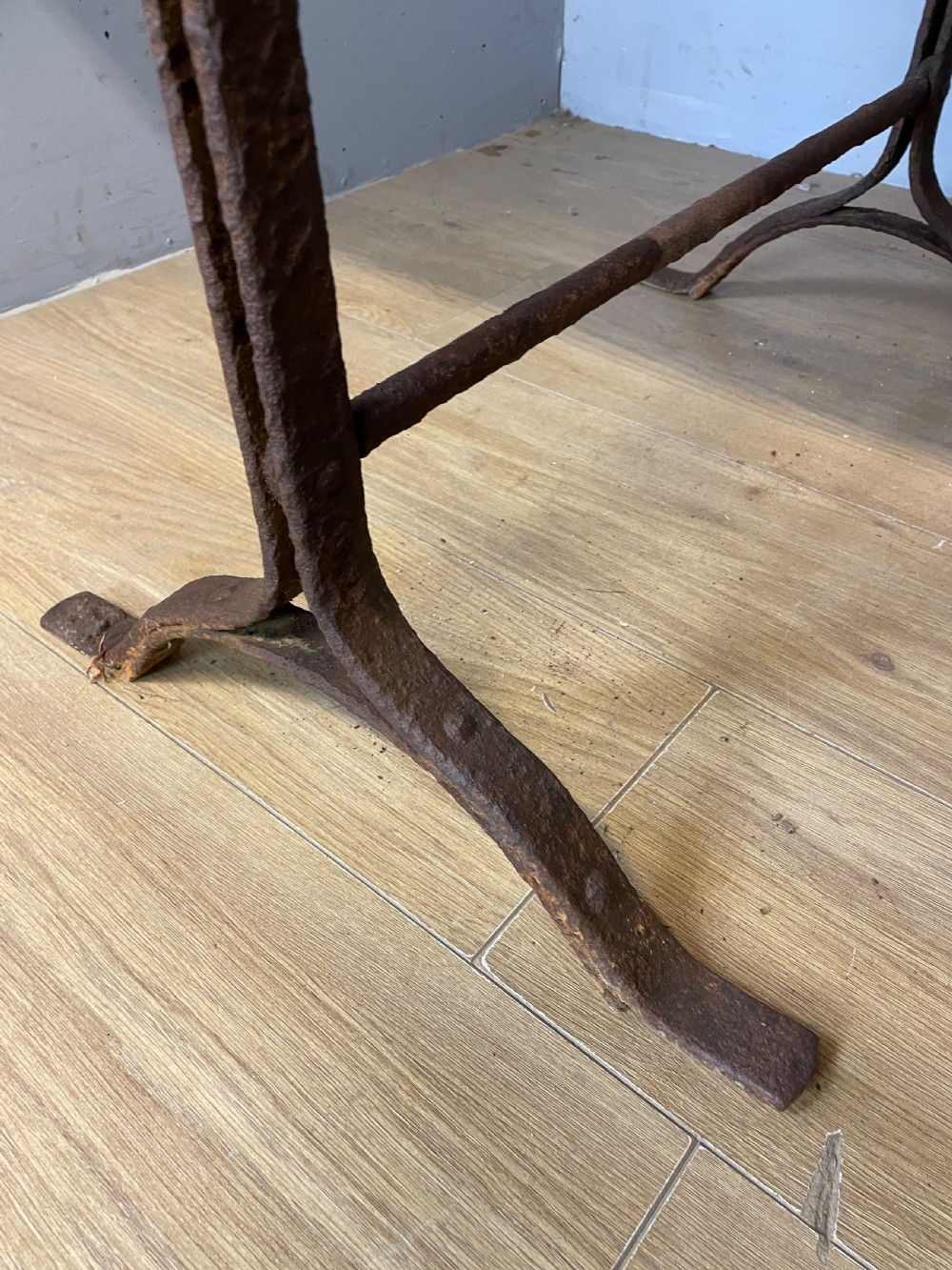 C19TH pine topped trestle table on wrought iron supports  View IV