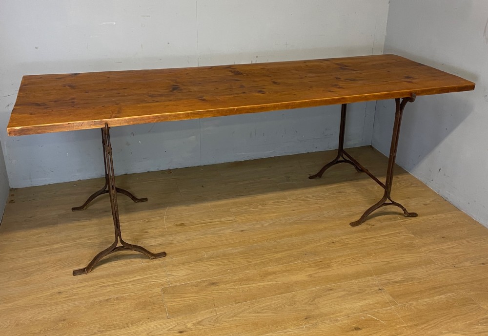 C19TH pine topped trestle table on wrought iron supports  View VIII