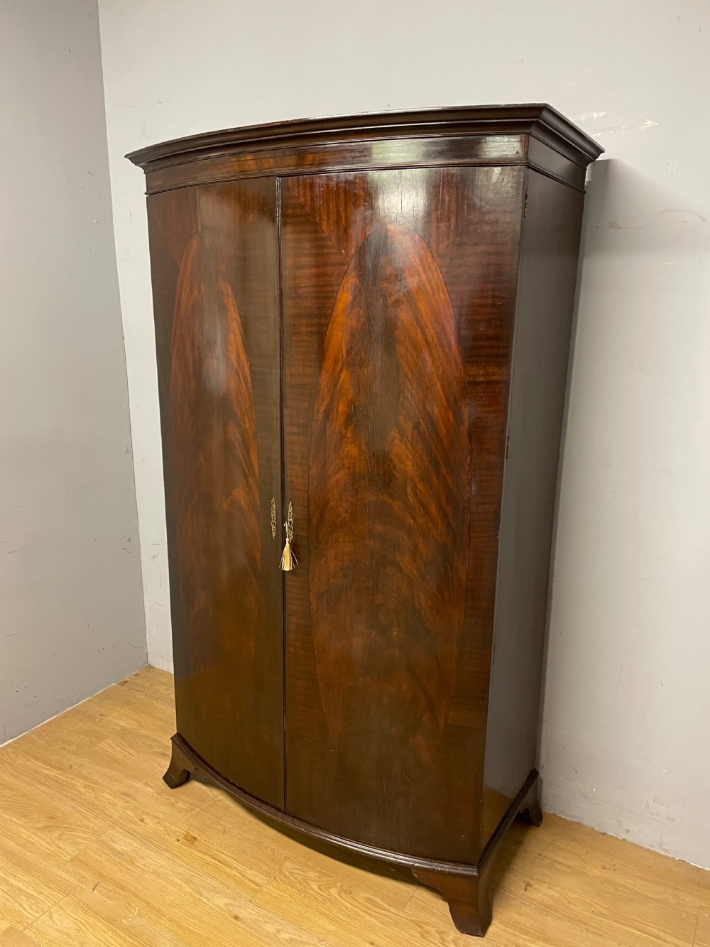 C19TH bow front flame mahogany wardrobe  View II